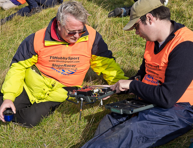Nigel Potter (right) shows John Bennett the 2.4 GHz conversion on his Multiplex 3030. More details at end.
