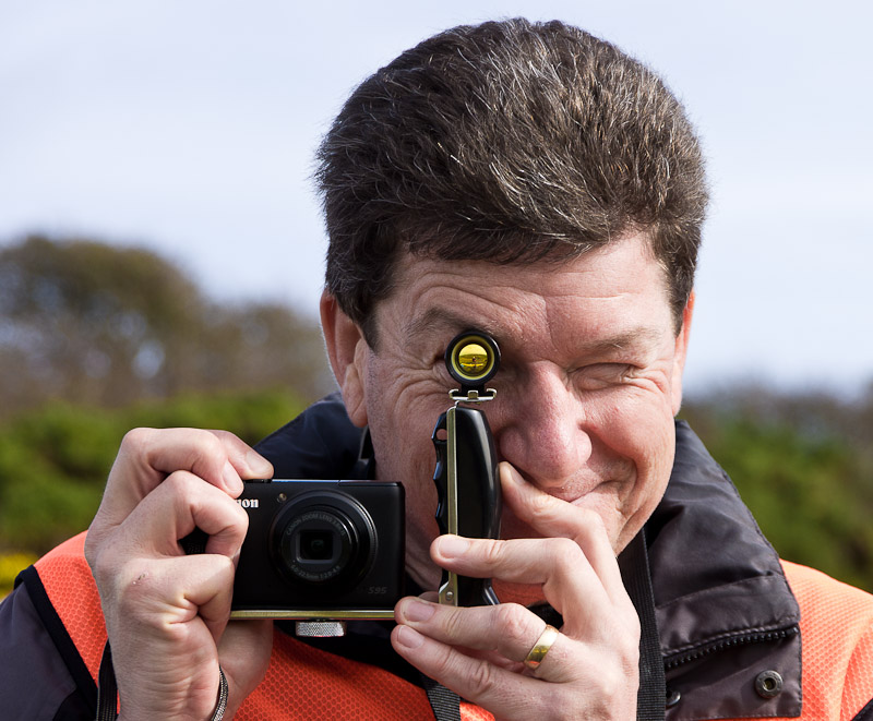 Boo! Phil Taylor shows the optical viewfinder rig on his Canon S95. Viewfinder provides easier aiming on bright days. Viewfinder was �20 from Mr Cad.