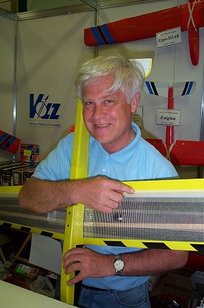 The irrepressible Stan Yeo of Phoenix Model Products showing he likes his Rico-She. The model is designed for 60inch EPP pylon racing.