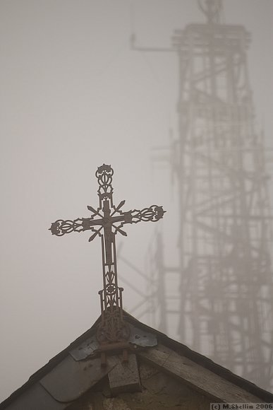 The chapel at La Madeleine vies with a microwave mast.